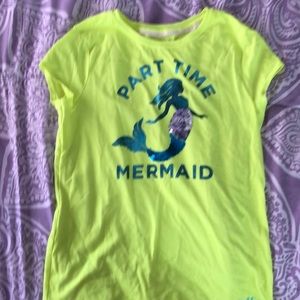 A neon green mermaid design